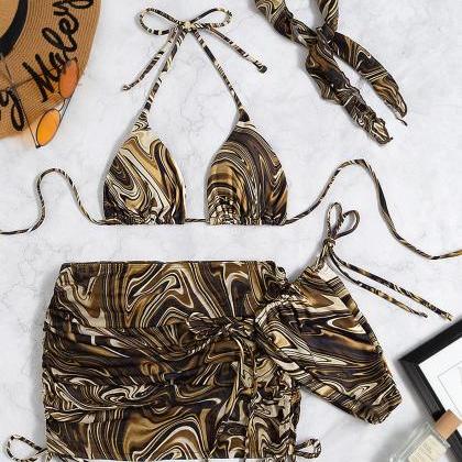 The Printed Swimsuit Comes In Four Pieces