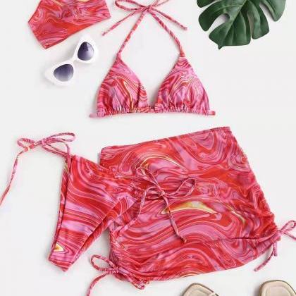 The Printed Swimsuit Comes In Four Pieces
