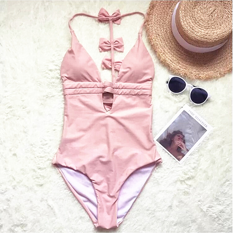 Cute fashion pure pink low chest holes back bowknot one piece bikini show thin