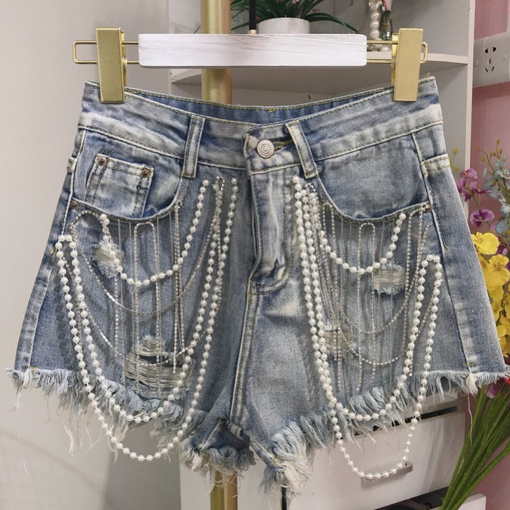Women's Denim Shorts With Fringed Pearl Pendant
