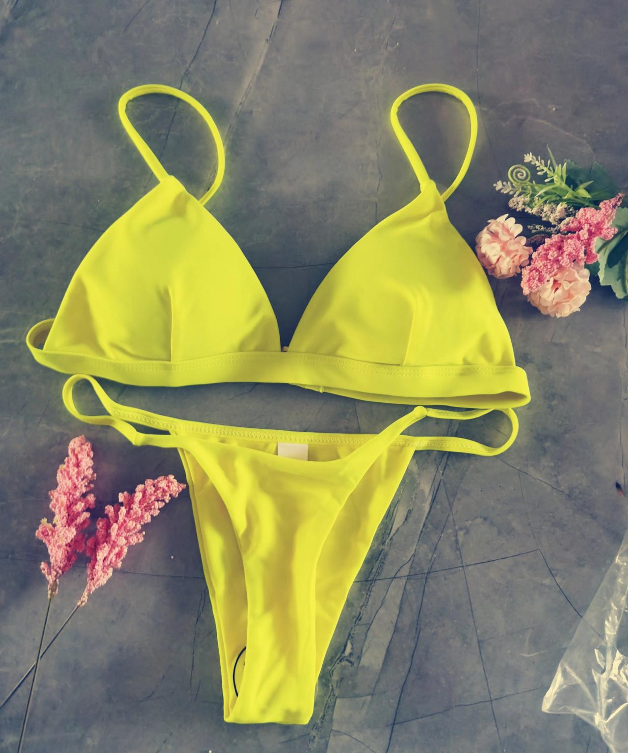 Bright yellow swimsuit sales