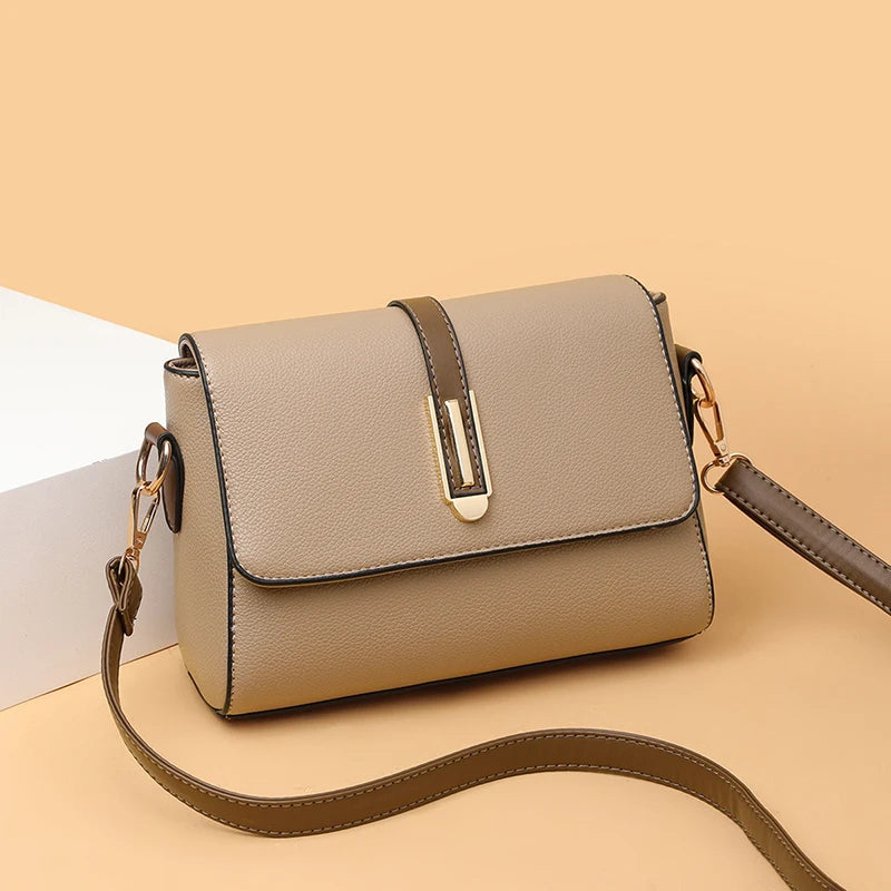 Elegant Beige Crossbody Bag With Gold Accents on Luulla display picture 3