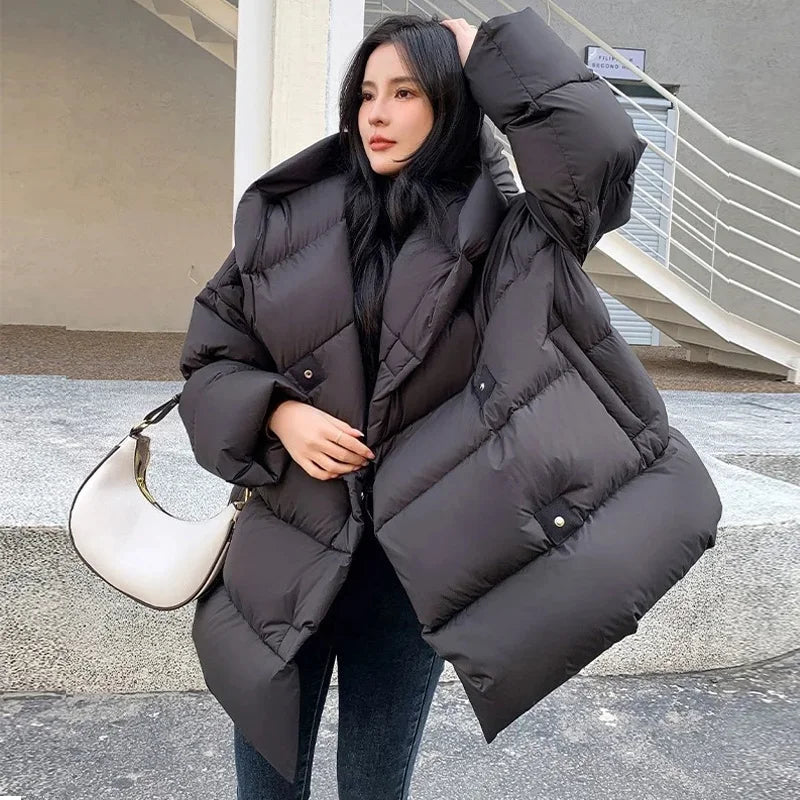 Oversized black puffer coat top
