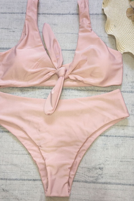 The Swimsuit Has A Knotted Chest And A High-waisted Solid Color Bikini
